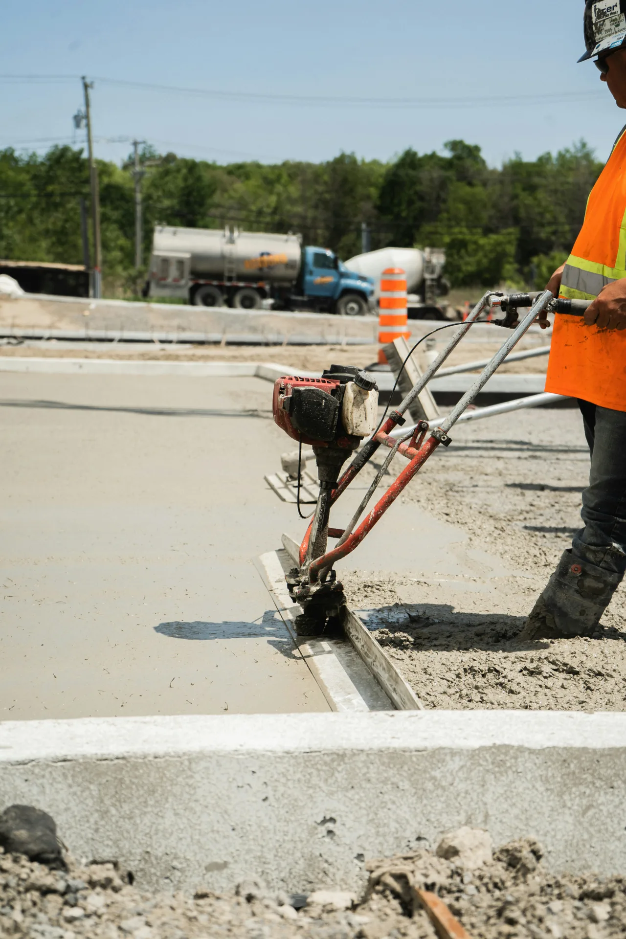 machine slipform curb and gutter being poured in Regina