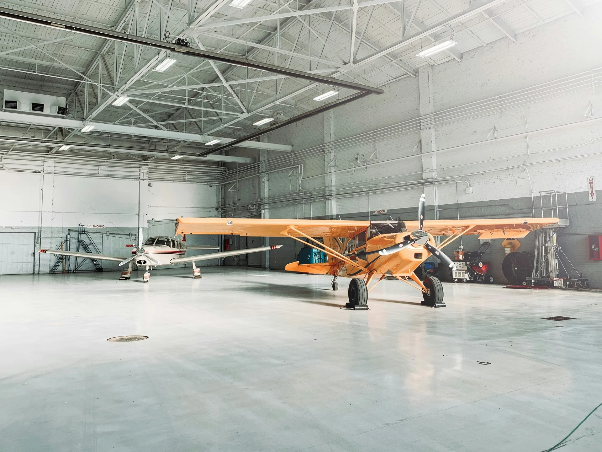 epoxy-coated aircraft hangar floor in a Regina facility