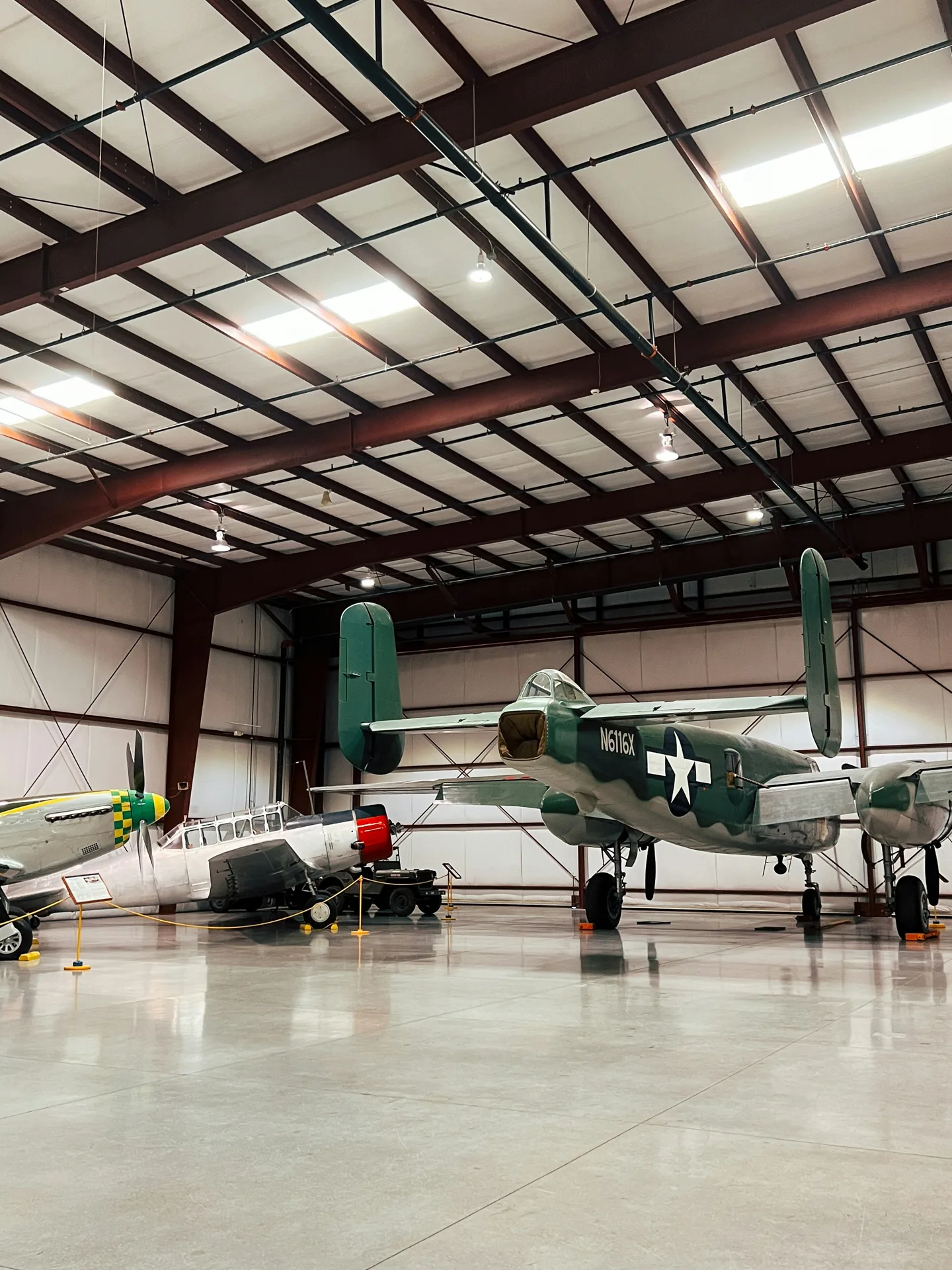 high-gloss concrete hangar floor with a vintage aircraft in Regina