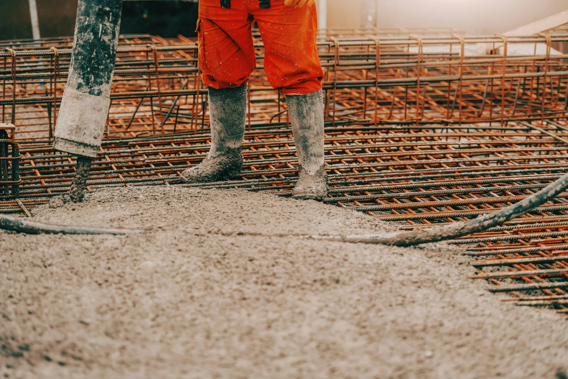 concrete pump operator placing concrete with a coiled hose in Regina