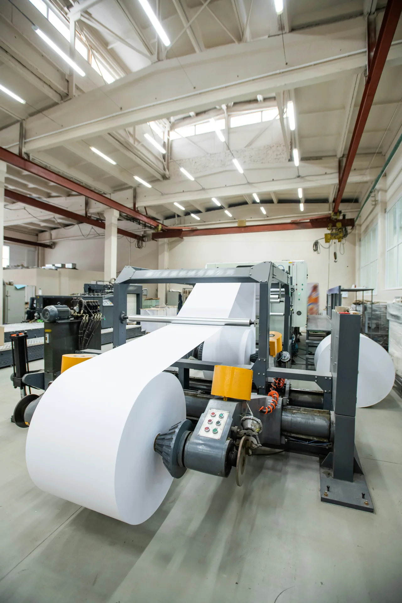 industrial concrete floor under a Regina printing press