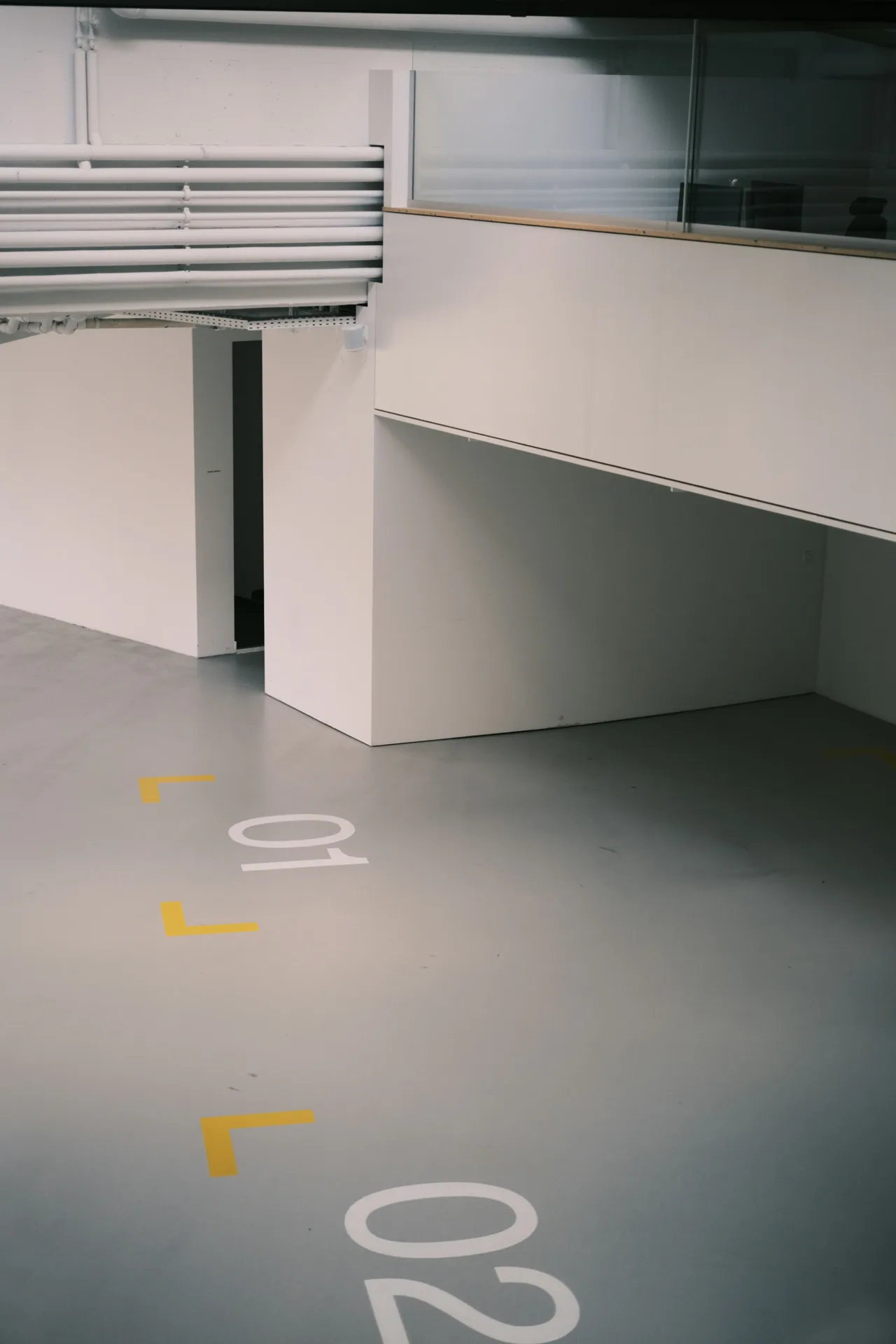 coated warehouse floor with line marking in a Regina facility