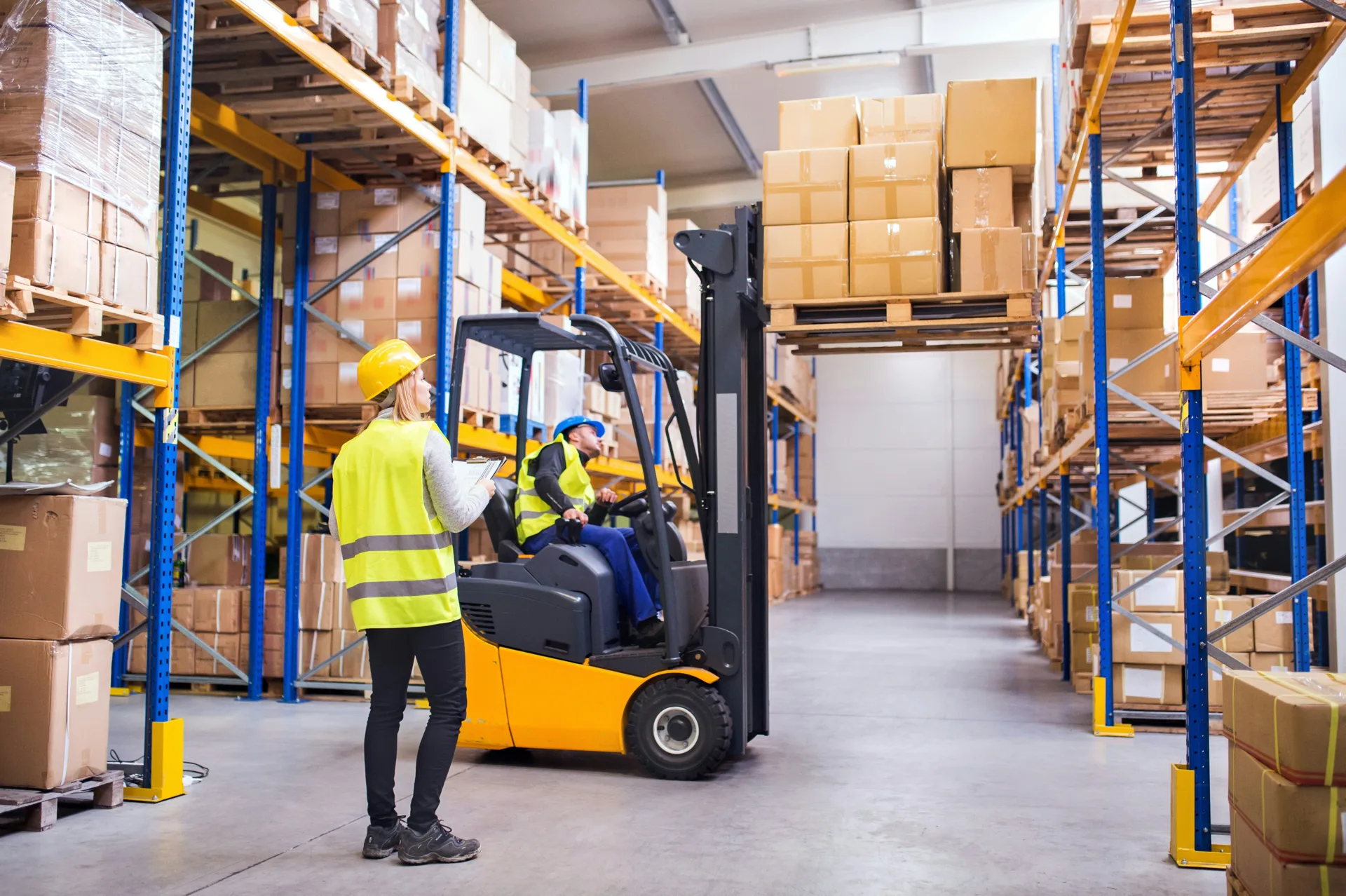 forklift on a finished warehouse concrete floor in Regina
