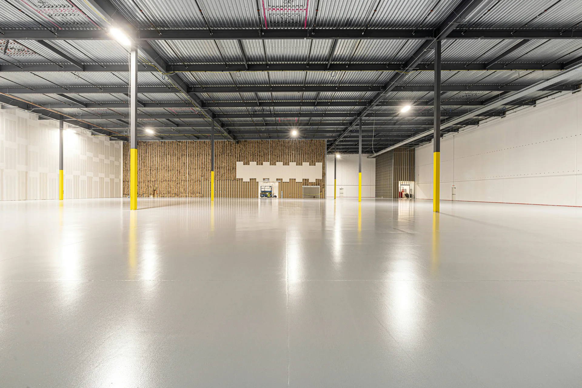 cold-storage warehouse floor with column protectors in Regina