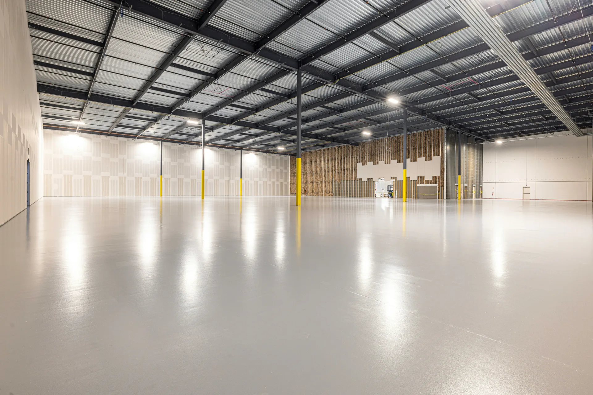 finished grey epoxy warehouse floor in a Regina distribution centre