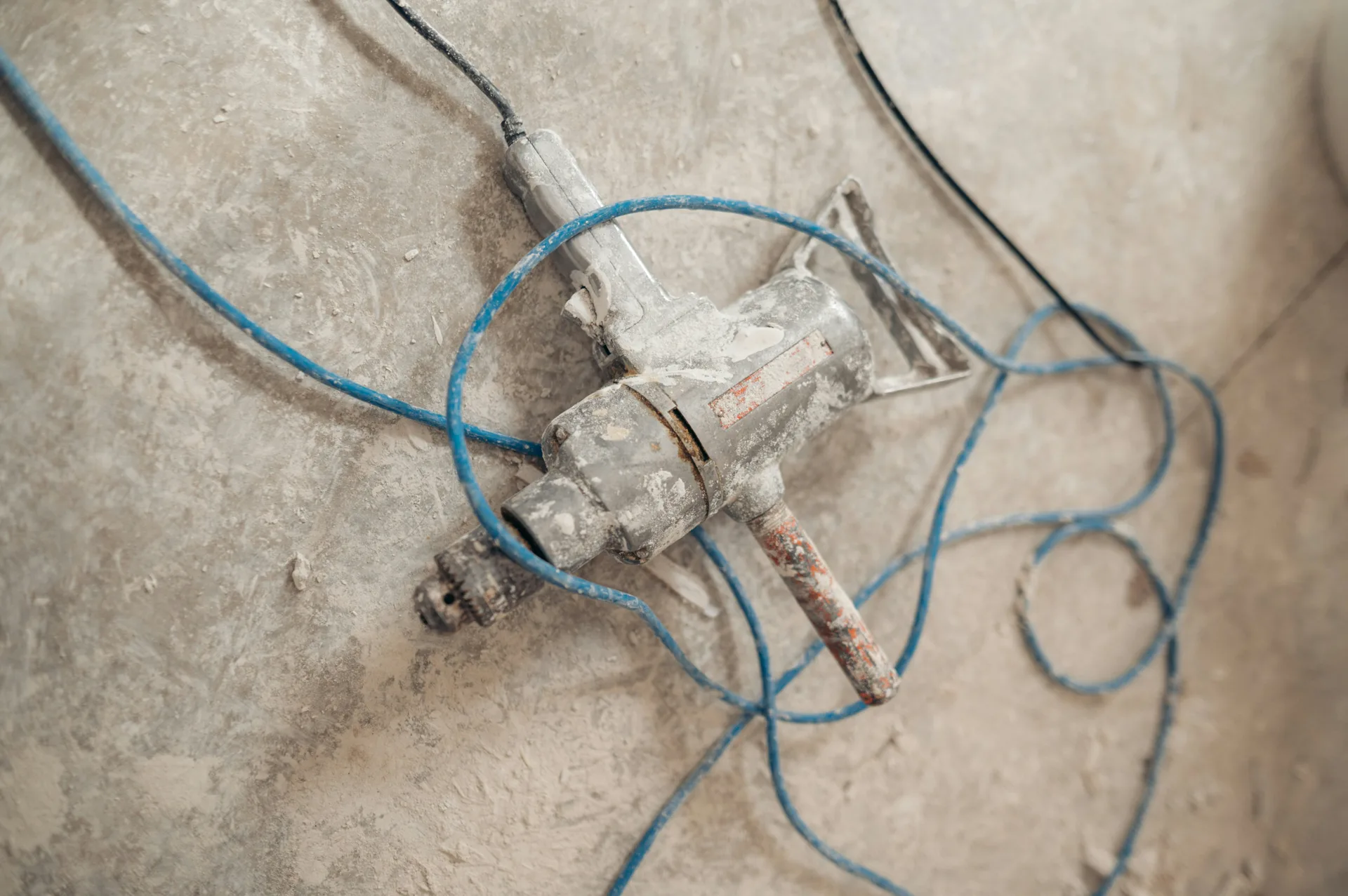 jackhammer removing a failed section of concrete for repair in Regina
