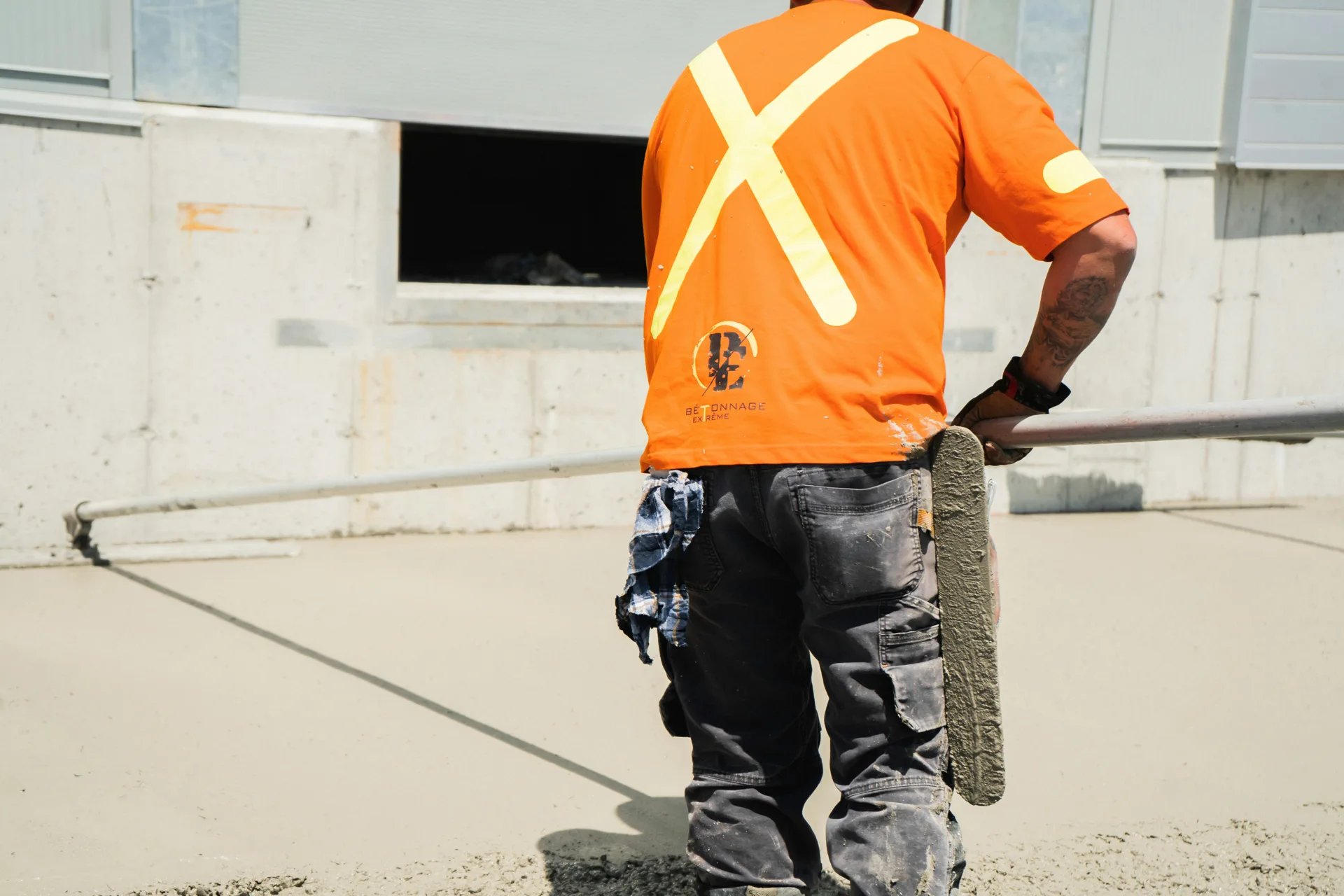 finisher working an Ardex application on a Regina floor