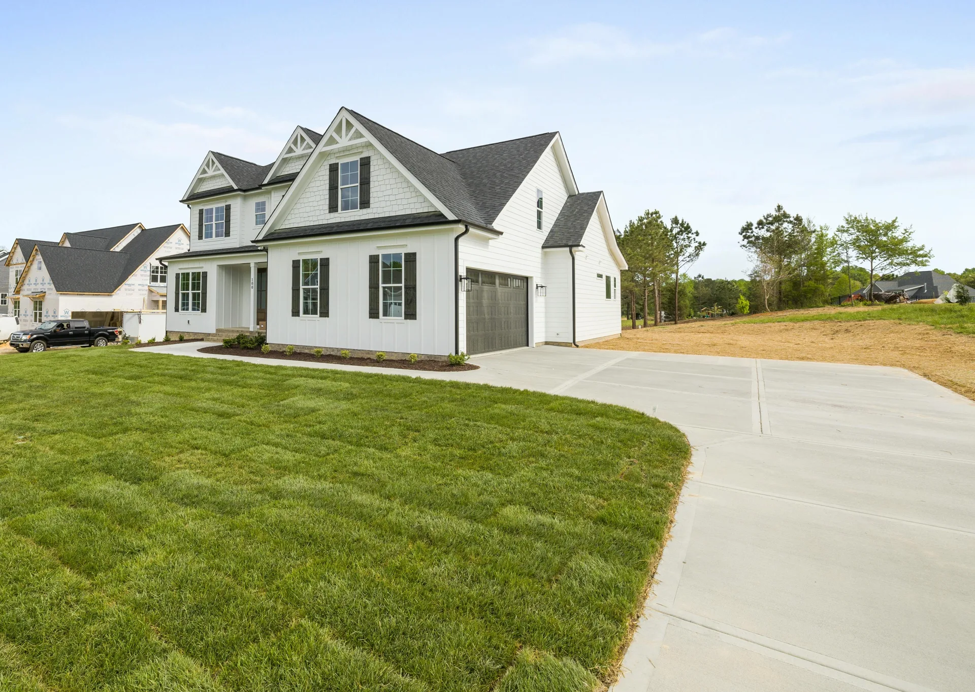curving concrete driveway at an acreage home near Regina