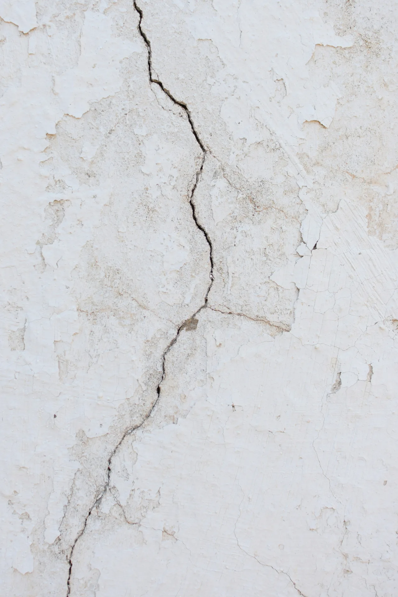 vertical crack in a residential concrete foundation wall in Regina