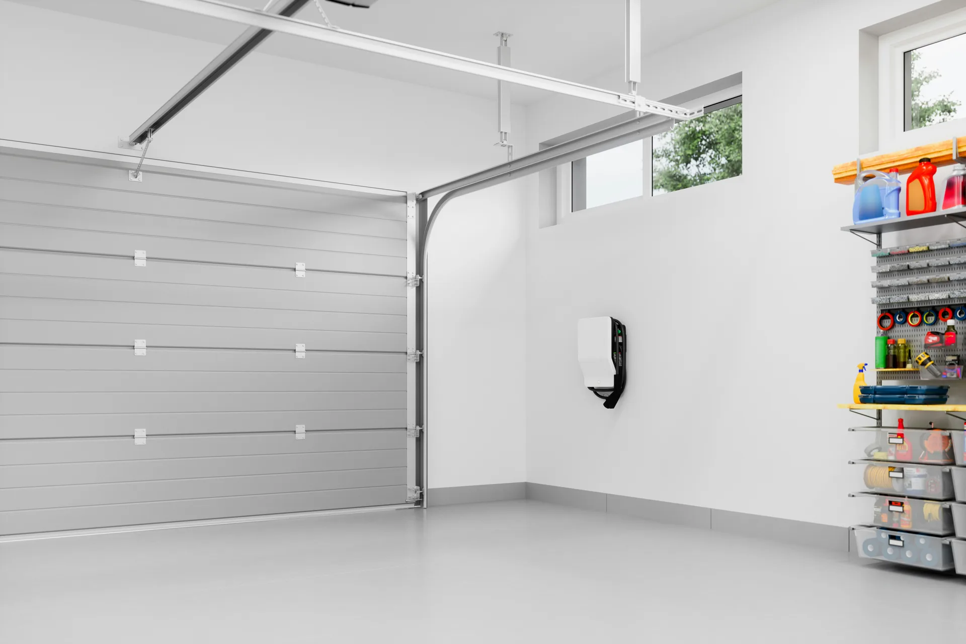 epoxy-coated garage floor with an EV charger at a Regina home