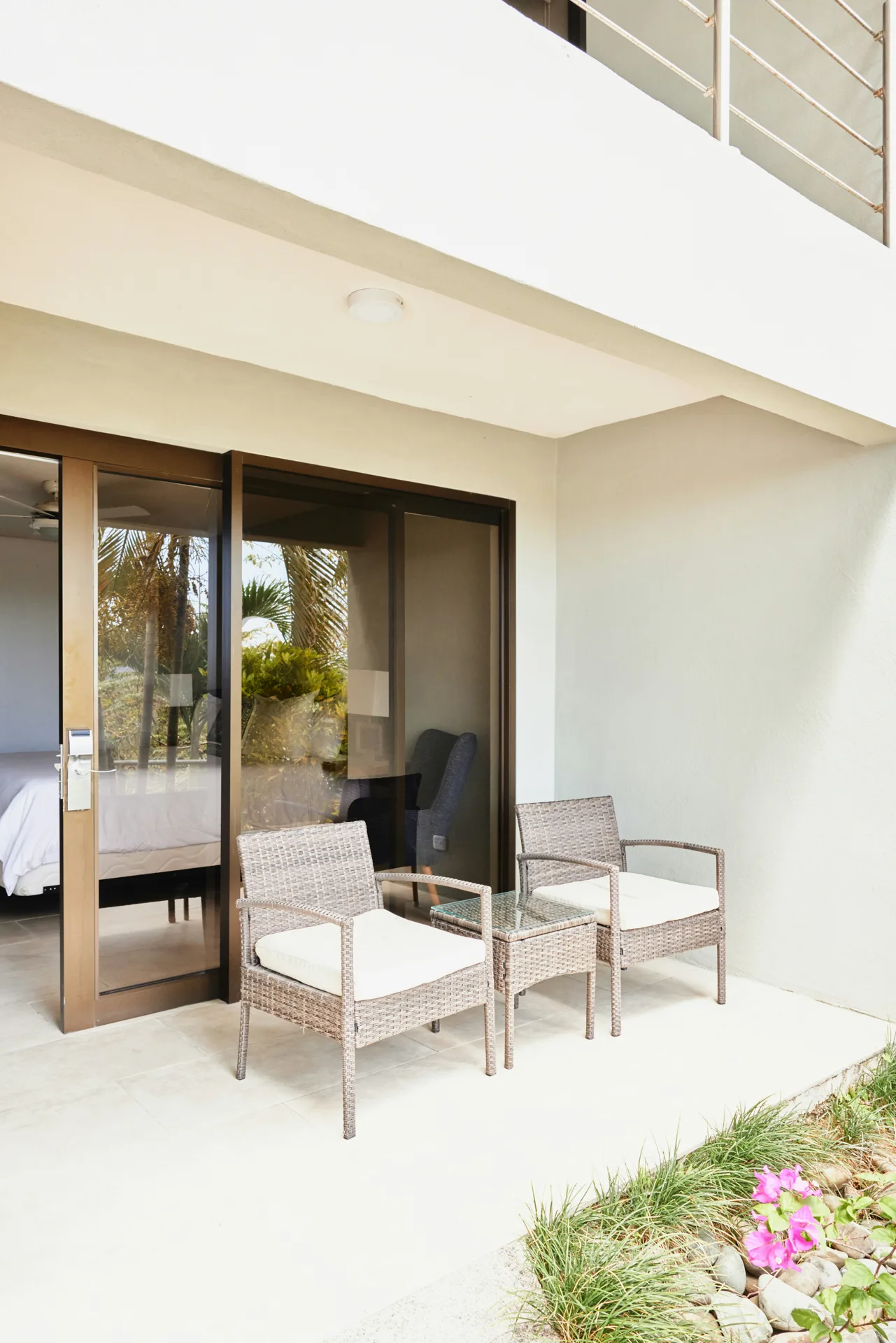 concrete patio pad off sliding doors at a Regina home