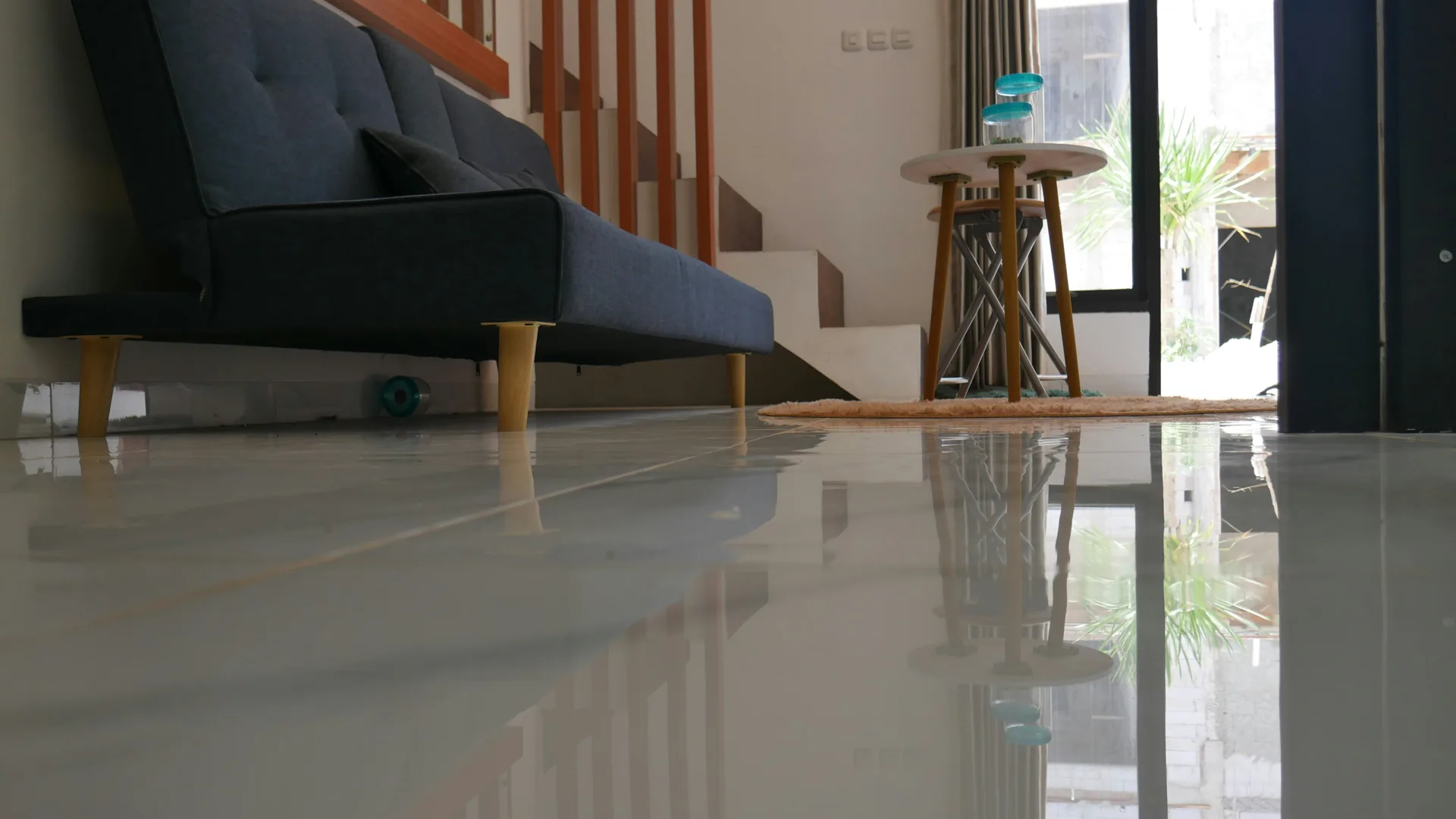 polished concrete floor reflecting light in a Regina living room